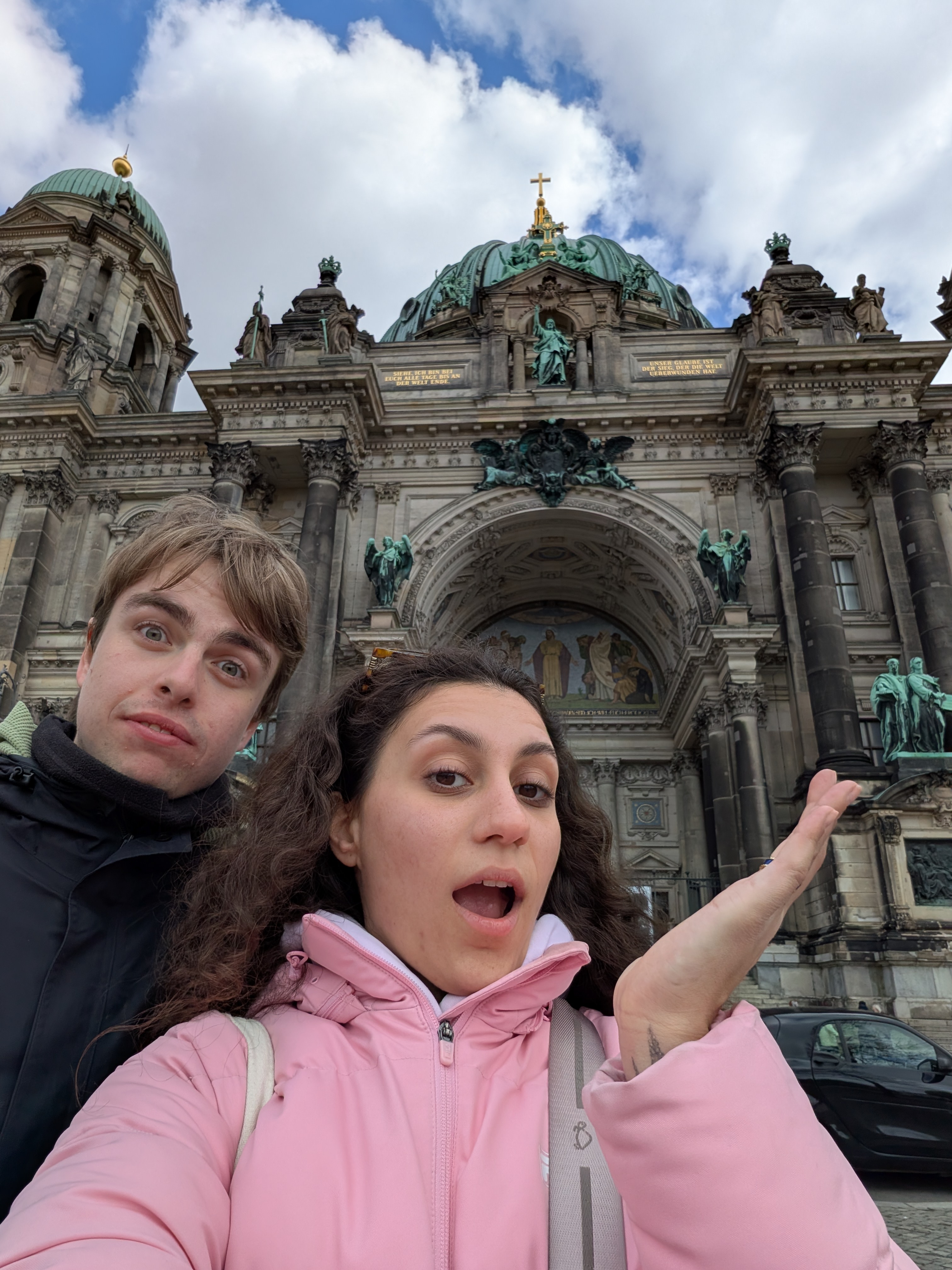 Us in front of building