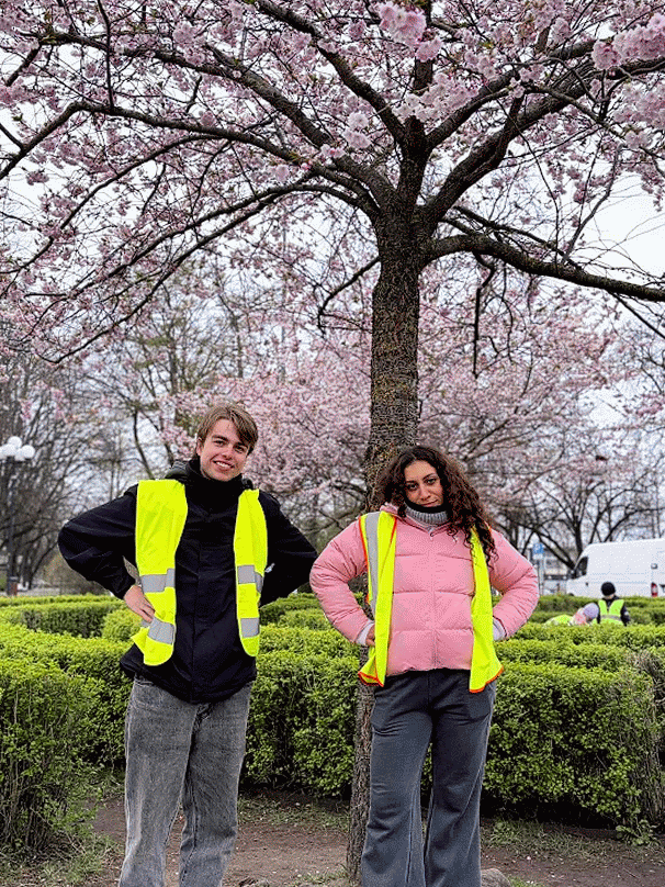 Us in front of building